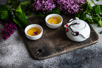 Tea concept with lilac
