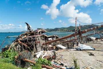 Hurricane Irma destroys a boat  on the island of st.maarten.  - obrazy, fototapety, plakaty