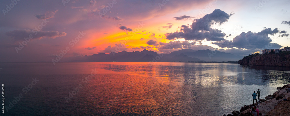 Wall mural sunset over antalya mountain range antalya, turkey - september 9, 2018 editorial photo.