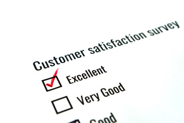 Survey form feedback satisfaction concept: Checklist check excellent word over application form document for customer. Opinion question choice filling checkmark for business marketing research