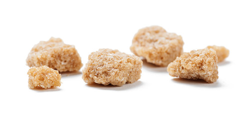 Brown sugar isolated on white background.