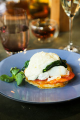 Pancakes with poached egg, cheese and spinach