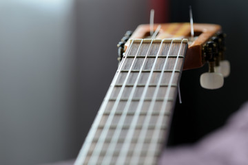 Part of an old acoustic guitar close up