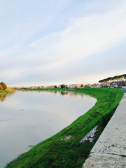 Arno River. Pisa, Italy. View on the river and city