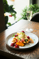Belgian waffles with ice cream and strawberry