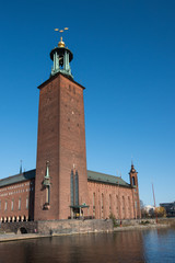 Fototapeta premium Water view over the Riddarfjärden bay in Stockholm a spring day at sunrise from the Riddarholmen island and Evert Taubes terrass.