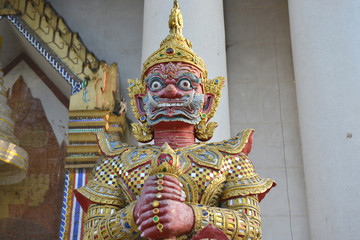 The Demon Guardian statue at the gate of the temple in Thailand.