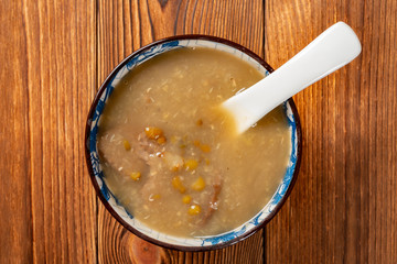 top view fresh mung bean paste syrup with orange peel