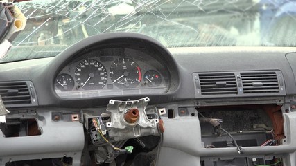Broken car, destroyed board, wheel and windscreen, damage of accident
