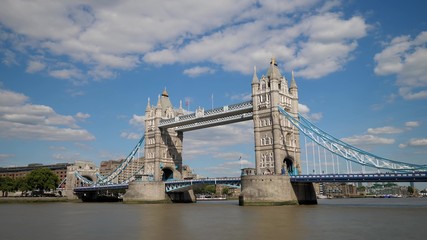 Fototapeta na wymiar Timelapse clouds passing over Tower Bridge of London