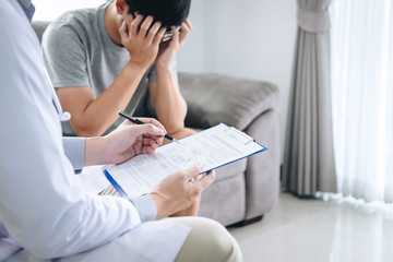 Doctor in white uniform gown coat and unhappy patient discussing consults explaining to treatment disease symptom and making prescriptions in hospital, healthcare and medical concept