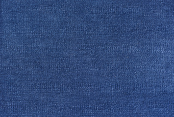 Texture of denim. Blue background.