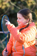 а girl and badminton