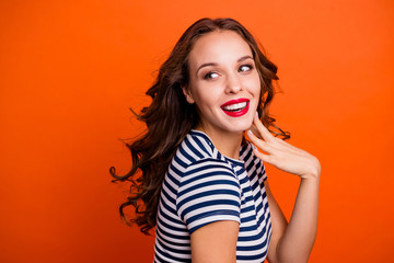 Close up portrait of glad fascinating with perfect tanned skin straight teeth she her lady holding hand near cheek looking aside isolated vivid vibrant background copyspace