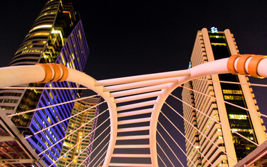 Sky walk at night architecture for passenger to transit between BTS and MRT train at sathorn station on Bangkok Thailand 