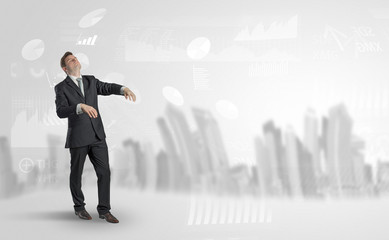 Young elegant businessman with city and report dream concept