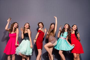 Portrait of nice lovely adorable smart charming fascinating stunning slim fit thin slender company cheerful elegant ladies having fun bachelor shadow isolated over violet gray background © deagreez