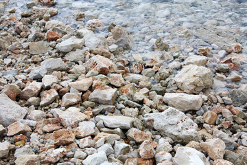 Sea stones background textures.