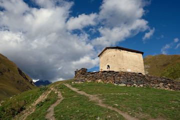 Fototapeta na wymiar Old church in the mountains of Svaneti in Ushguli Georgia
