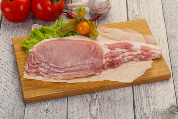 Raw pork bacon