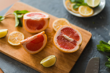 Citrus and lemonade on the table in summer