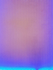 Full Frame Background of Wire Mesh with Colorful Back Lighting