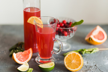 Citrus and lemonade on the table in summer