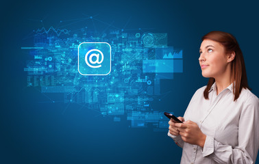 Young person using phone with mail and online communication concept
