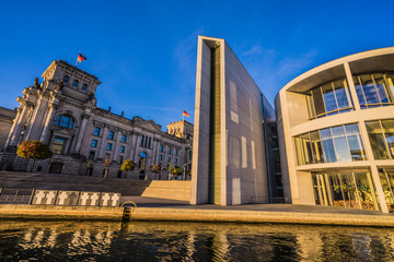 Fototapeta na wymiar Berlin on water Bundestag at sunrise