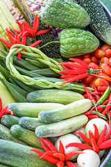 Vegetables in Thailand Cucumber , Tomato , Bitter gourd and red chilli.
