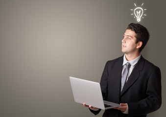 Young smiling person presenting new idea concept
