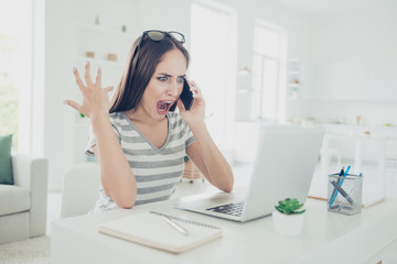 Close up photo beautiful she her lady notebook table yell hands arms raised air bad news telephone epic fail lost wear jeans denim striped t-shirt sit comfort chair house bright living room indoors