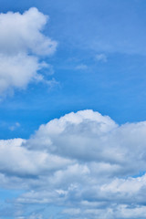 Naklejka na ściany i meble Clouds on a blue sky sunny day