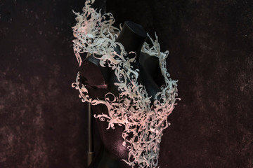 Piece made with 3d printer, is composed of white flowers that form a corset, handmade, fantasy design Baroque style