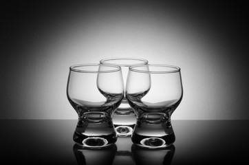 Still life of glass goblets to the light.