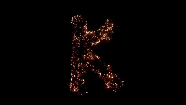Letter K burning. Steel wool smoldering. Beautiful combustion.