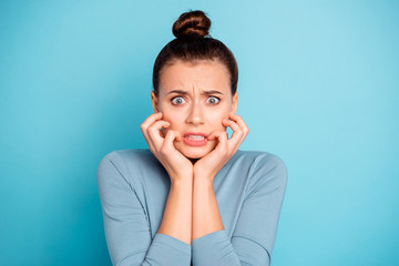 Close up photo beautiful amazing she her lady oh no lose epic fail face hold hands arms raised cheeks cheekbones funny funky stylish hairstyle wear sweater pullover isolated blue bright background
