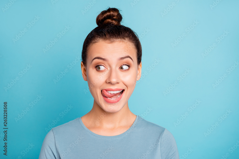 Sticker Close up photo beautiful amazing she her lady look side empty space licking tongue upper lip crazy silly mischief carefree mood giggling wear casual sweater pullover isolated blue bright background