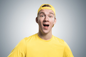 Happy teenager with mouth opened