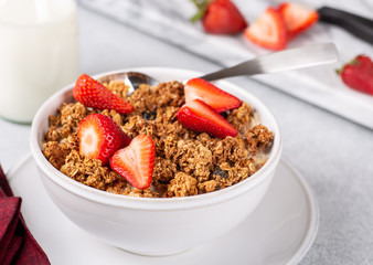 Bowl of Ganola With Fresh Strawberries