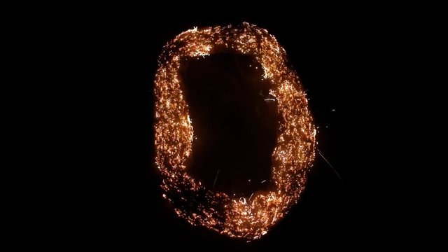Letter O burning. Steel wool smoldering. Beautiful combustion.