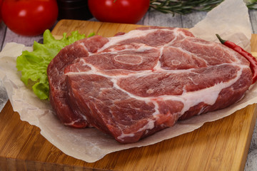 Raw pork neck steak