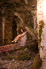 Portrait of romantic woman at fairy forest in autumn.