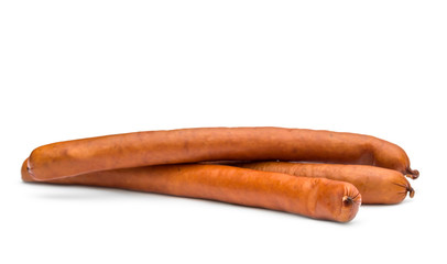 Heap of thin smoked sausage on white.