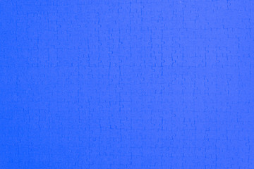 mosaic bright colored background from a puzzle, deep blue tone