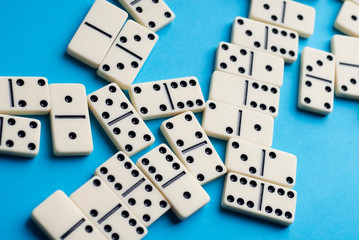 dominoes on blue background.