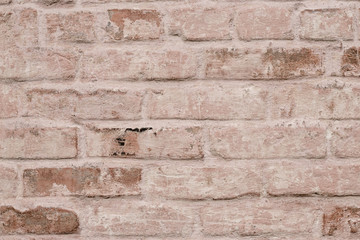 Light brown brick wall texture. Old pink brick wall background. Retro pattern with old brick wall. Grunge background. Space texture. Beige retro rough texture. Urban street texture. Home interior deco