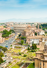 Fototapeta na wymiar Beautiful aerial view. Colosseum in sunny spring day. Rome. Italy