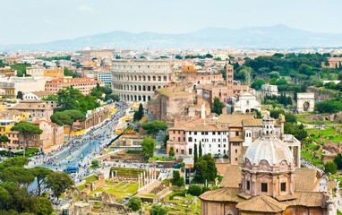 Fototapeta premium Scenic aerial view of Colosseum. Panorama. Spring day. Rome. Italy