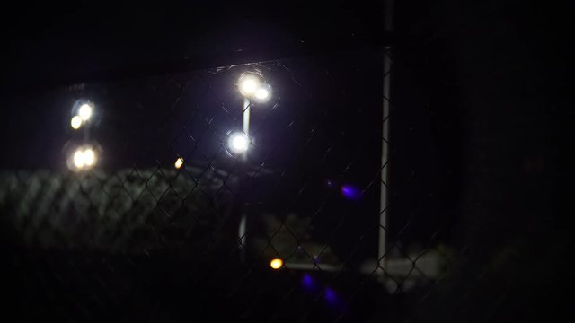 Prison Fence At Night